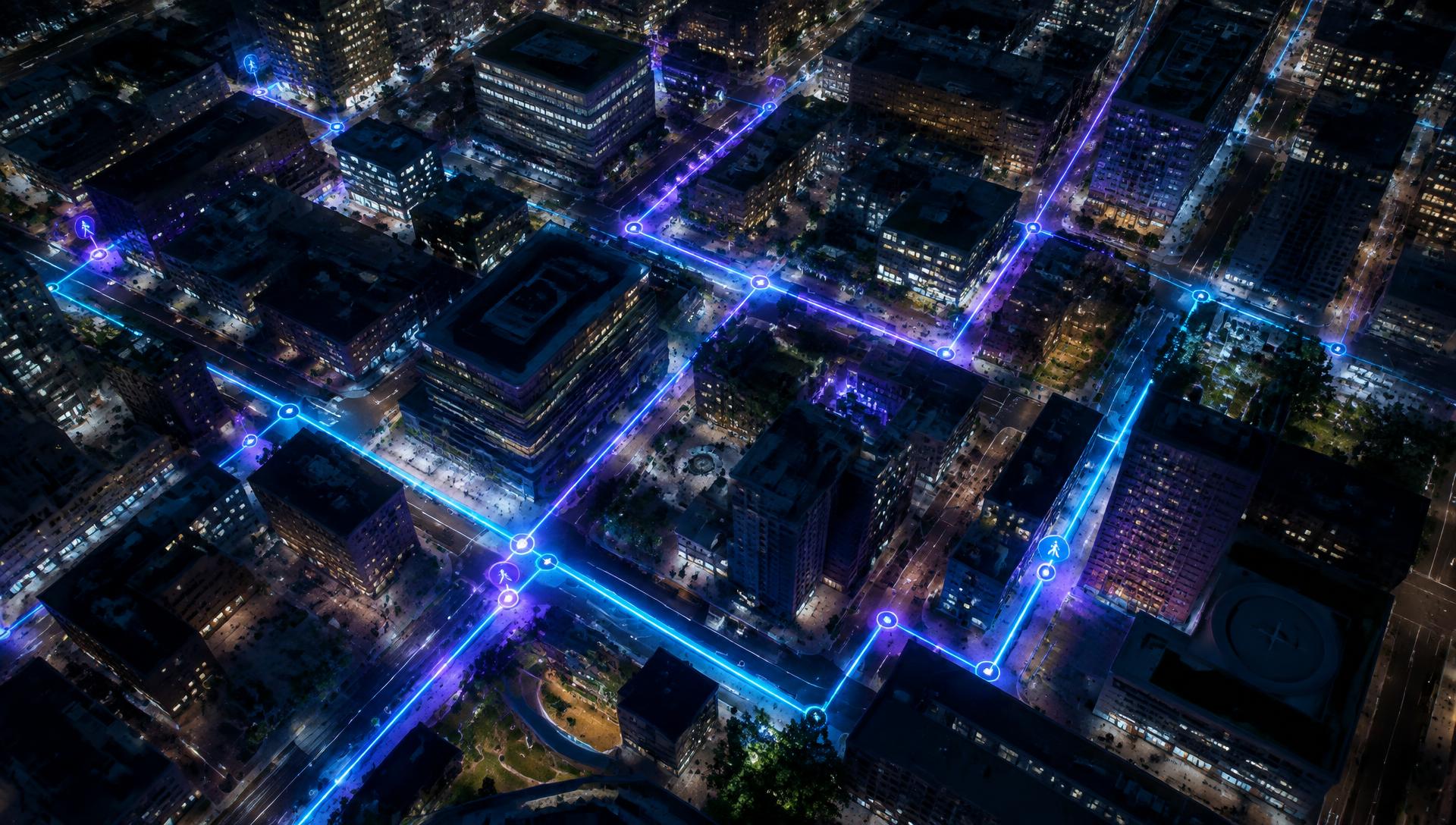 A city at night with glowing safe routes connecting its streets